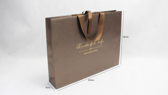 Sacs en papier irisés d'or lumineux sérigraphiant les sacs-cadeaux de papier de Brown