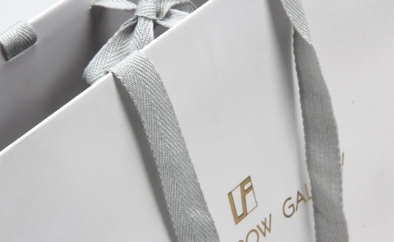 Sacs en papier personnalisés blancs Lunettes haut de gamme Shopping Sacs en papier