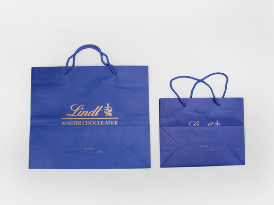 C1S C2S sacs en papier personnalisés enduits brillants sacs en papier à provisions de vêtement de bleu de mer
